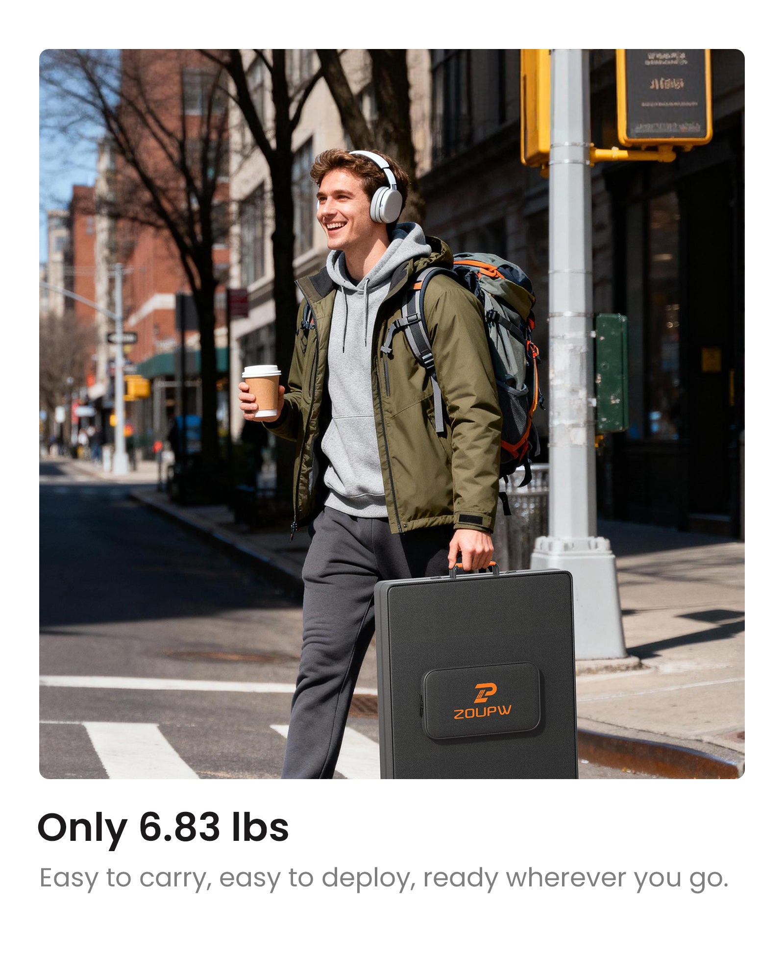 A model effortlessly holding the folded solar panel